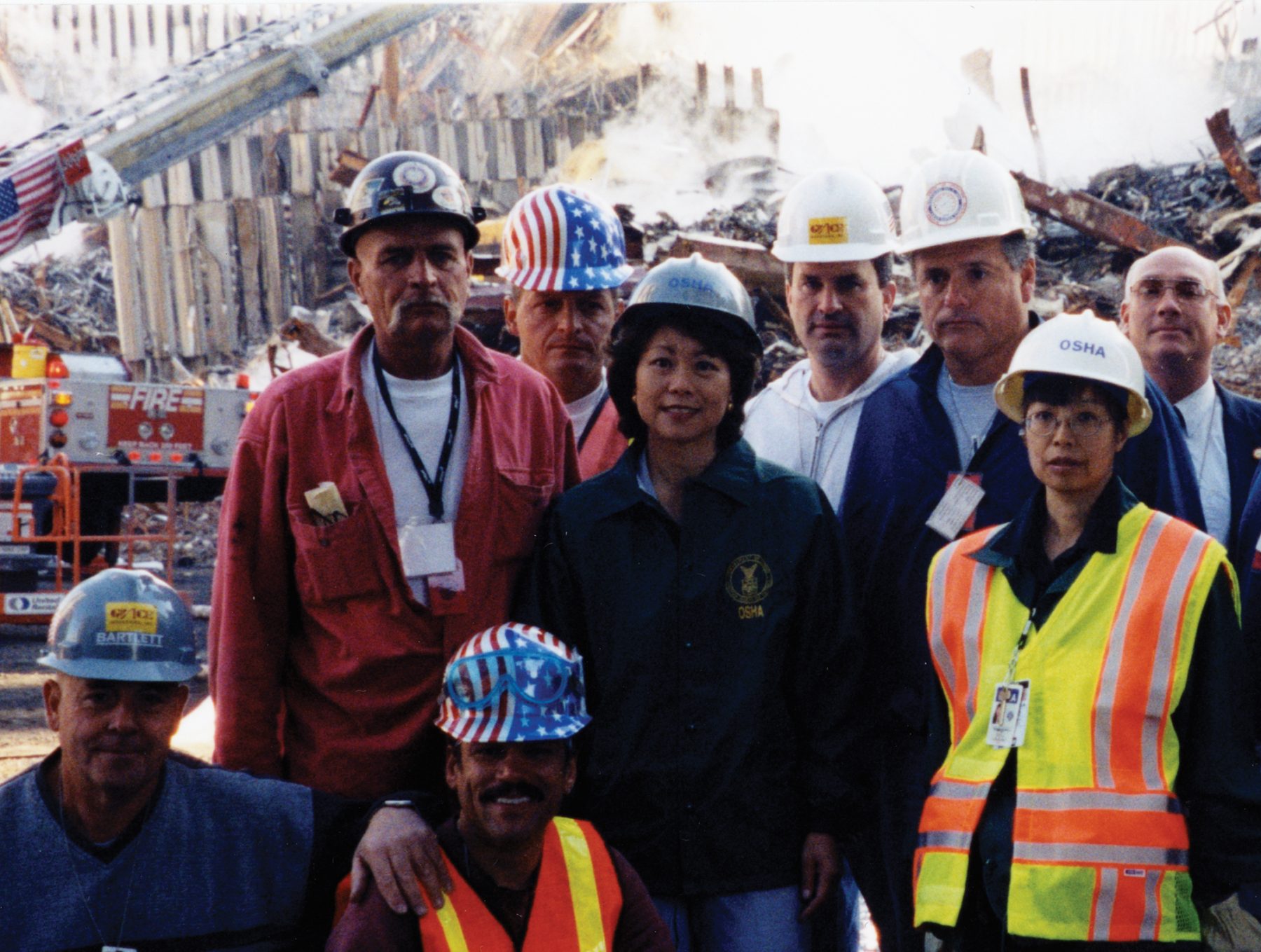 Secretary Elaine Chao with OSHA colleagues and workers at Ground Zero after 9/11/01.