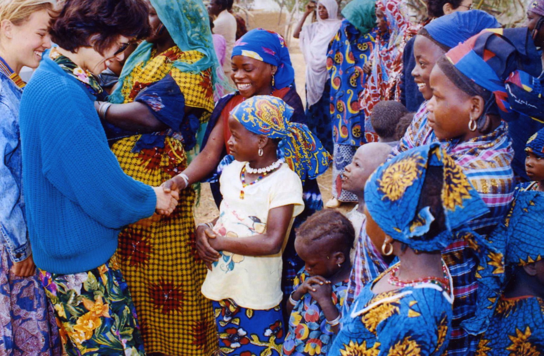 Peace Corps Director Elaine Chao visiting Peace Corps Volunteers and village children in Niger. 