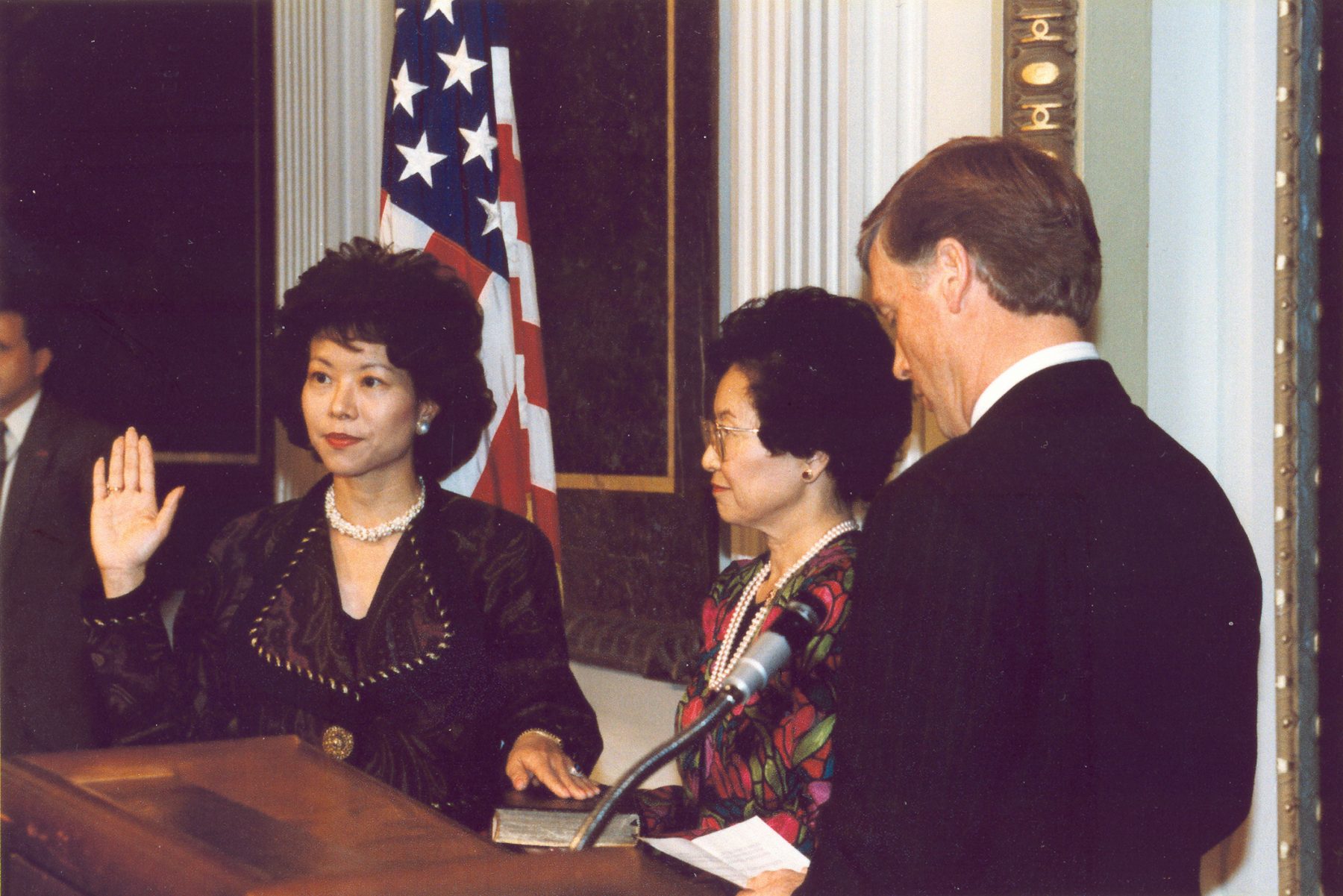 Elaine Chao being sworn in by Vice President Dan Quayle as the first Asian Pacific American Director of the Peace Corps.