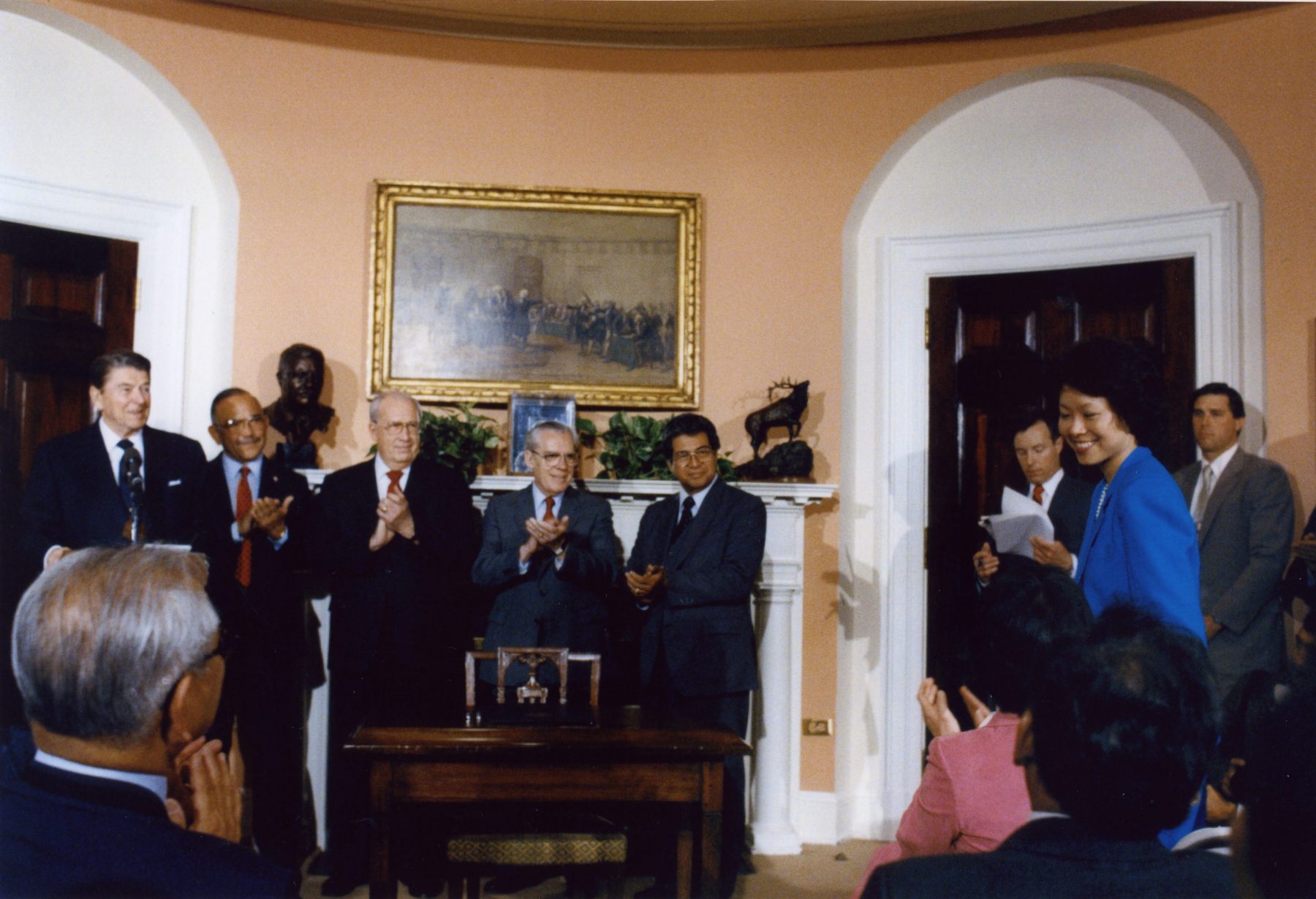 Deputy Maritime Administrator Elaine Chao being acknowledged by President Ronald Reagan at an event in the Roosevelt Room at The White House.